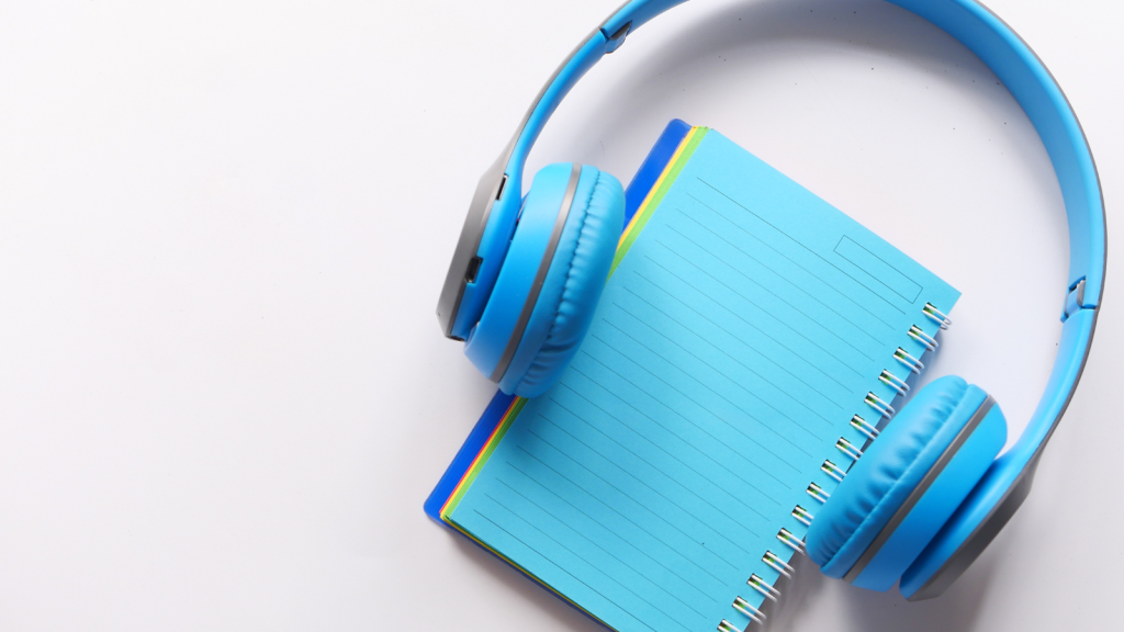Headphones and a notepad